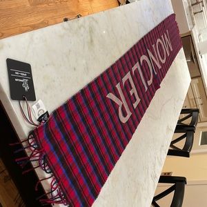 Moncler Scarf with Logo 90 x 13 never used.  Monicker logo is woven in